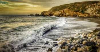Pacifica: the beaches are only the beginning Pacfica,, CA, Rockaway Beach "Watchin' the tide roll in.", Sunset golden reflections on the waves, Taken about 5 p.m. as the sun was descending into the horizon.
