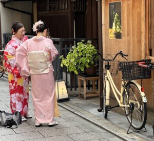 Geisha dressed in style honor tradition and reverence for women.