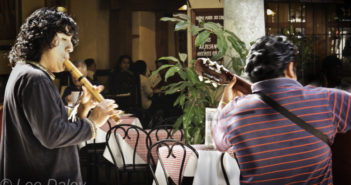 Oaxaca: A collage of culture and cuisine Oaxaca: A collage of culture and cuisine, Oaxaca Cafe Culture, Flute player and guitarist serenade cafe patrons