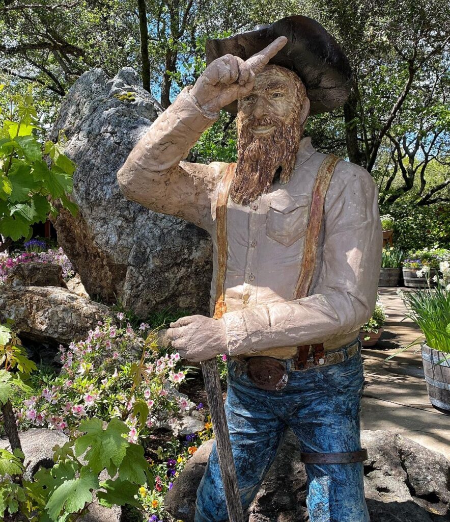 Gold Rush miner statue welcomes visitors to the winery